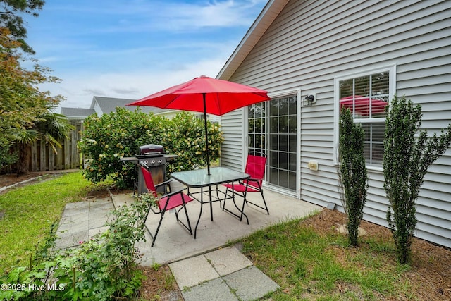 1182 Amber Pines Dr, Leland, NC 28451 - view of patio featuring outdoor dining area and a grill