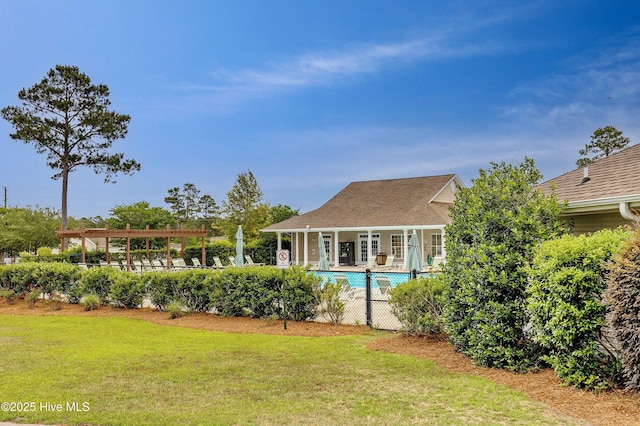 1182 Amber Pines Dr, Leland, NC 28451 - rear view of house featuring a community pool