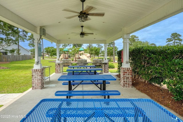 1182 Amber Pines Dr, Leland, NC 28451 - view of patio / terrace with a playground and a ceiling fan