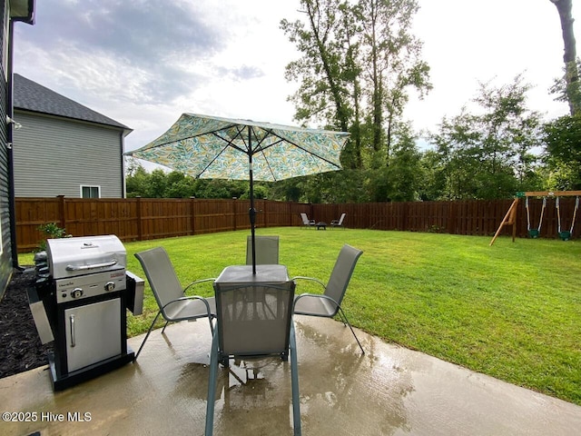 4224 Pegasus Pkwy, Leland, NC 28451 - view of patio featuring outdoor dining area, grilling area, and a playground