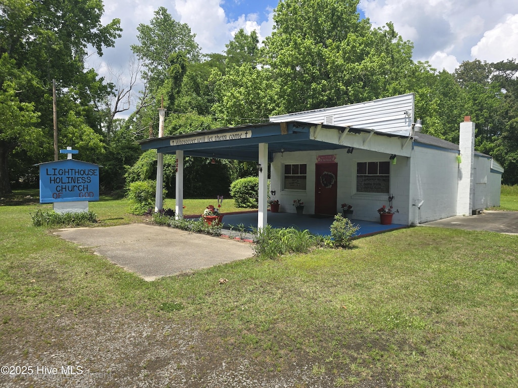 219 Poplar Neck Rd, Edenton, NC 27932 - exterior space with an attached carport