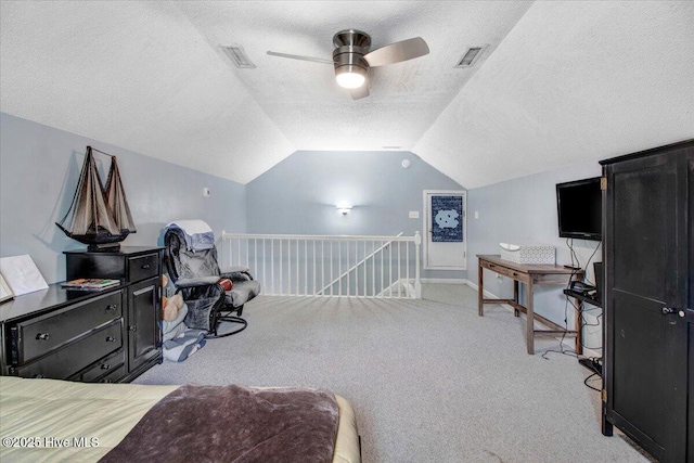 208 N Woodridge Dr, Pikeville, NC 27863 - bedroom with light colored carpet, vaulted ceiling, a textured ceiling, a ceiling fan, and baseboards