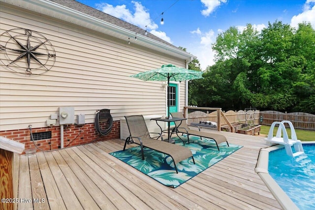 208 N Woodridge Dr, Pikeville, NC 27863 - view of wooden deck