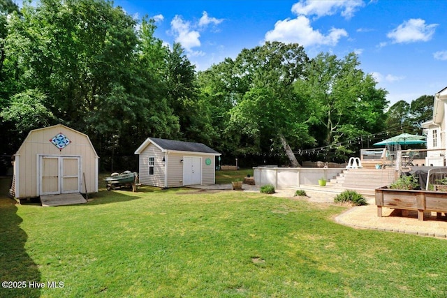 208 N Woodridge Dr, Pikeville, NC 27863 - view of grassy yard featuring a garden and view of scattered trees