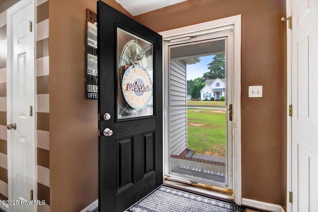 208 N Woodridge Dr, Pikeville, NC 27863 - entryway featuring baseboards
