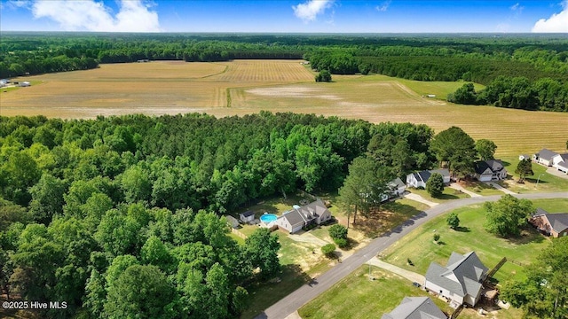 208 N Woodridge Dr, Pikeville, NC 27863 - aerial view of property and surrounding area with rural landscape, a forest, and extensive farmland
