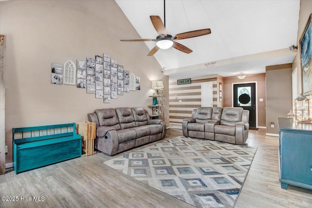 208 N Woodridge Dr, Pikeville, NC 27863 - living area featuring high vaulted ceiling, wood finished floors, ceiling fan, and baseboards