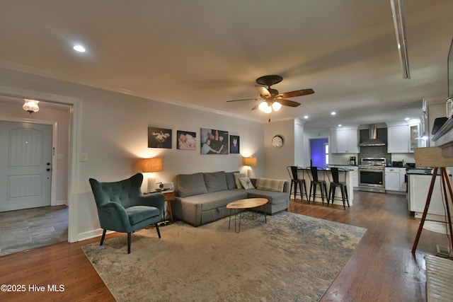 114 Lansdowne Rd, Wilmington, NC 28409 - living area featuring ornamental molding, ceiling fan, dark wood finished floors, recessed lighting, and baseboards