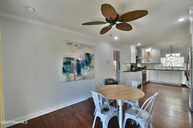 114 Lansdowne Rd, Wilmington, NC 28409 - dining space with ornamental molding, a ceiling fan, dark wood-type flooring, baseboards, and recessed lighting