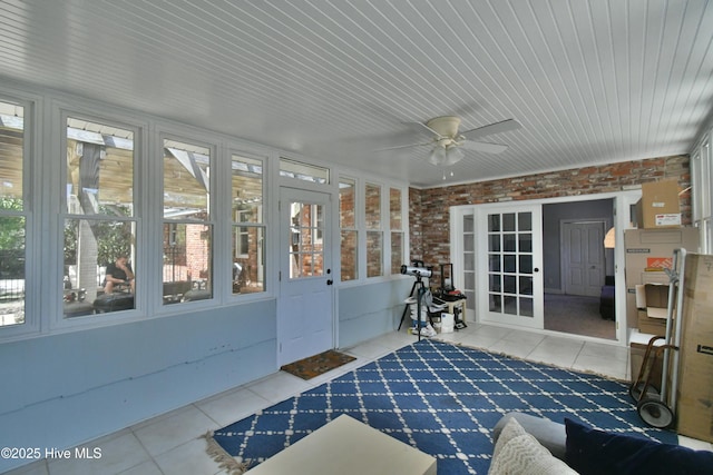 114 Lansdowne Rd, Wilmington, NC 28409 - sunroom with tile patterned flooring, brick wall, healthy amount of natural light, and wood ceiling