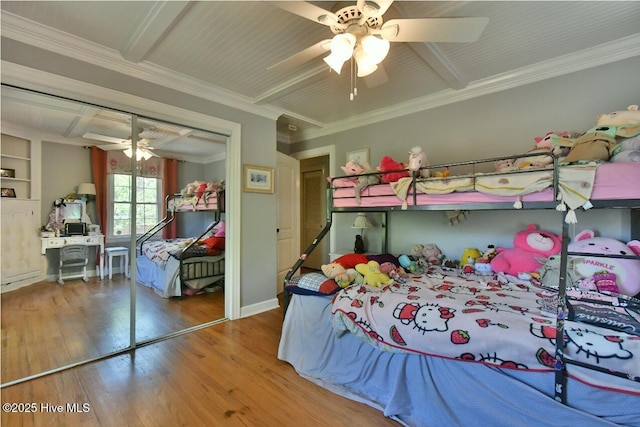 114 Lansdowne Rd, Wilmington, NC 28409 - bedroom with a closet, wood finished floors, a ceiling fan, and baseboards