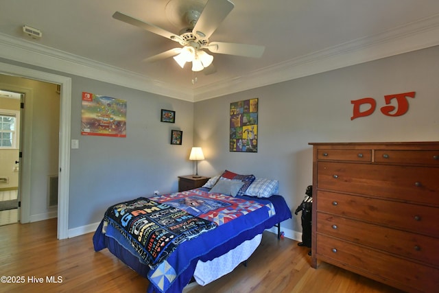 114 Lansdowne Rd, Wilmington, NC 28409 - bedroom featuring light wood-type flooring, baseboards, ornamental molding, and ceiling fan