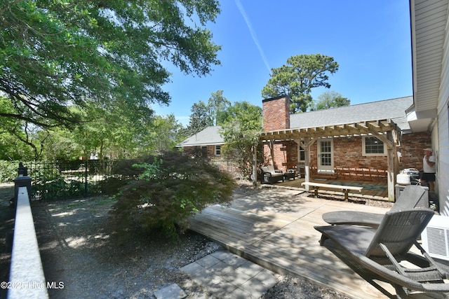 114 Lansdowne Rd, Wilmington, NC 28409 - view of patio featuring a pergola and a wooden deck