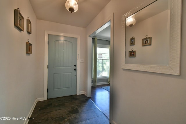 114 Lansdowne Rd, Wilmington, NC 28409 - foyer with baseboards and dark stone finish flooring