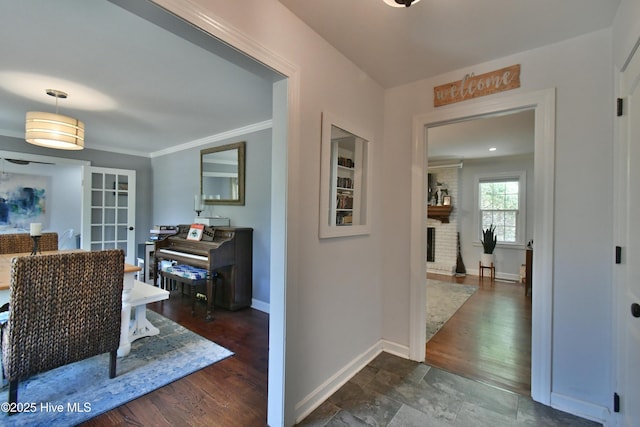 114 Lansdowne Rd, Wilmington, NC 28409 - corridor featuring baseboards, crown molding, and dark wood-style floors