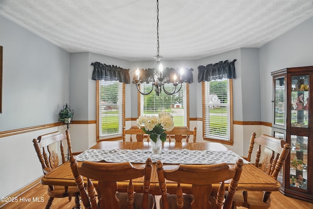 145 N Point Blvd, Moyock, NC 27958 - dining space with a chandelier and wood finished floors