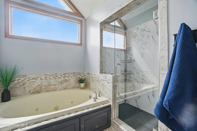 145 N Point Blvd, Moyock, NC 27958 - full bathroom featuring a jetted tub, a marble finish shower, and lofted ceiling