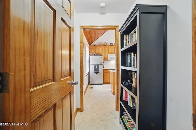 145 N Point Blvd, Moyock, NC 27958 - corridor with light flooring, lofted ceiling, and baseboards