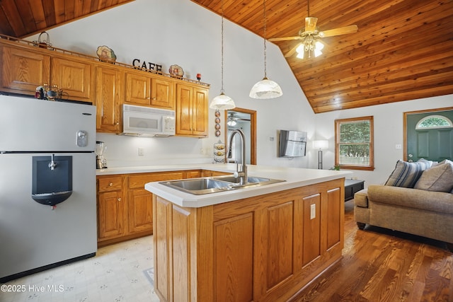145 N Point Blvd, Moyock, NC 27958 - kitchen featuring freestanding refrigerator, white microwave, a sink, wooden ceiling, and ceiling fan