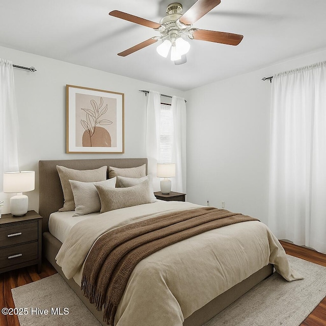 145 N Point Blvd, Moyock, NC 27958 - bedroom featuring dark wood-type flooring and ceiling fan