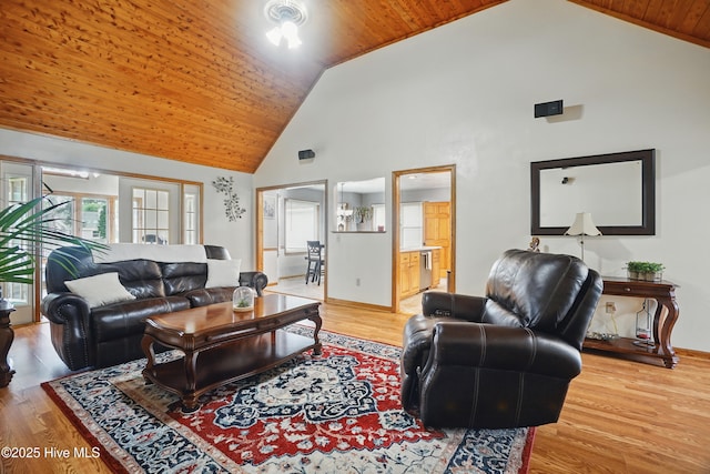 145 N Point Blvd, Moyock, NC 27958 - living room featuring high vaulted ceiling, wooden ceiling, light wood-style flooring, and baseboards