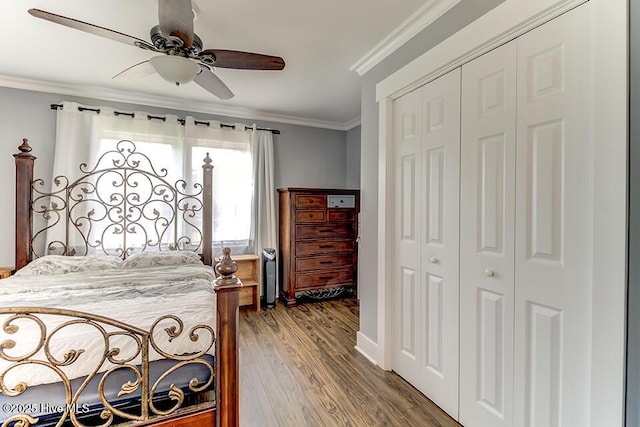 4838 Stillwell Rd, Wilmington, NC 28412 - bedroom with a closet, dark wood-style floors, crown molding, ceiling fan, and baseboards
