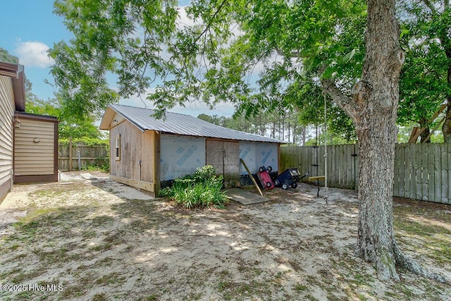 4838 Stillwell Rd, Wilmington, NC 28412 - fenced backyard featuring an outdoor structure