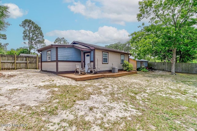 4838 Stillwell Rd, Wilmington, NC 28412 - back of house with a deck, a fenced backyard, and cooling unit