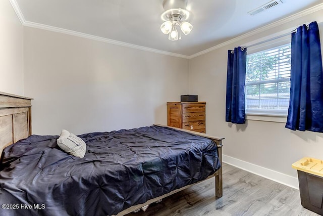 4838 Stillwell Rd, Wilmington, NC 28412 - bedroom with wood finished floors, baseboards, and ornamental molding