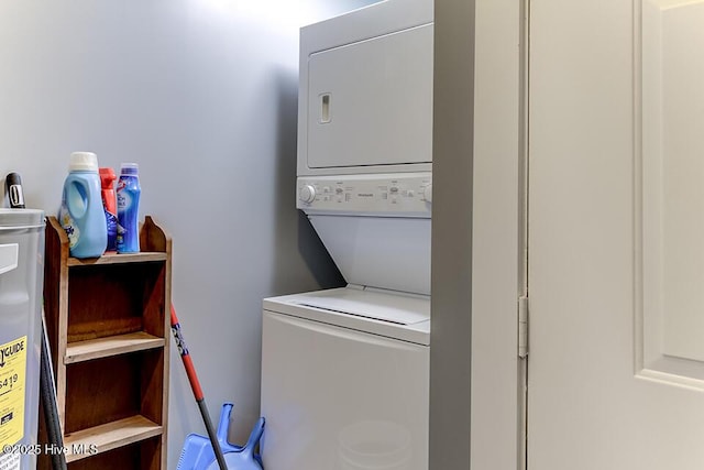 4838 Stillwell Rd, Wilmington, NC 28412 - laundry room with stacked washer and clothes dryer and water heater