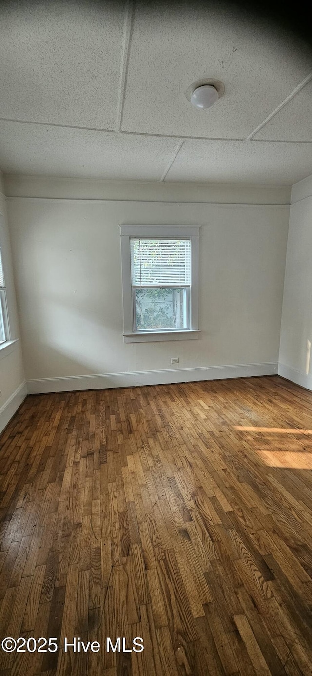 1205 S 7th St, Wilmington, NC 28401 - empty room with hardwood / wood-style flooring and baseboards