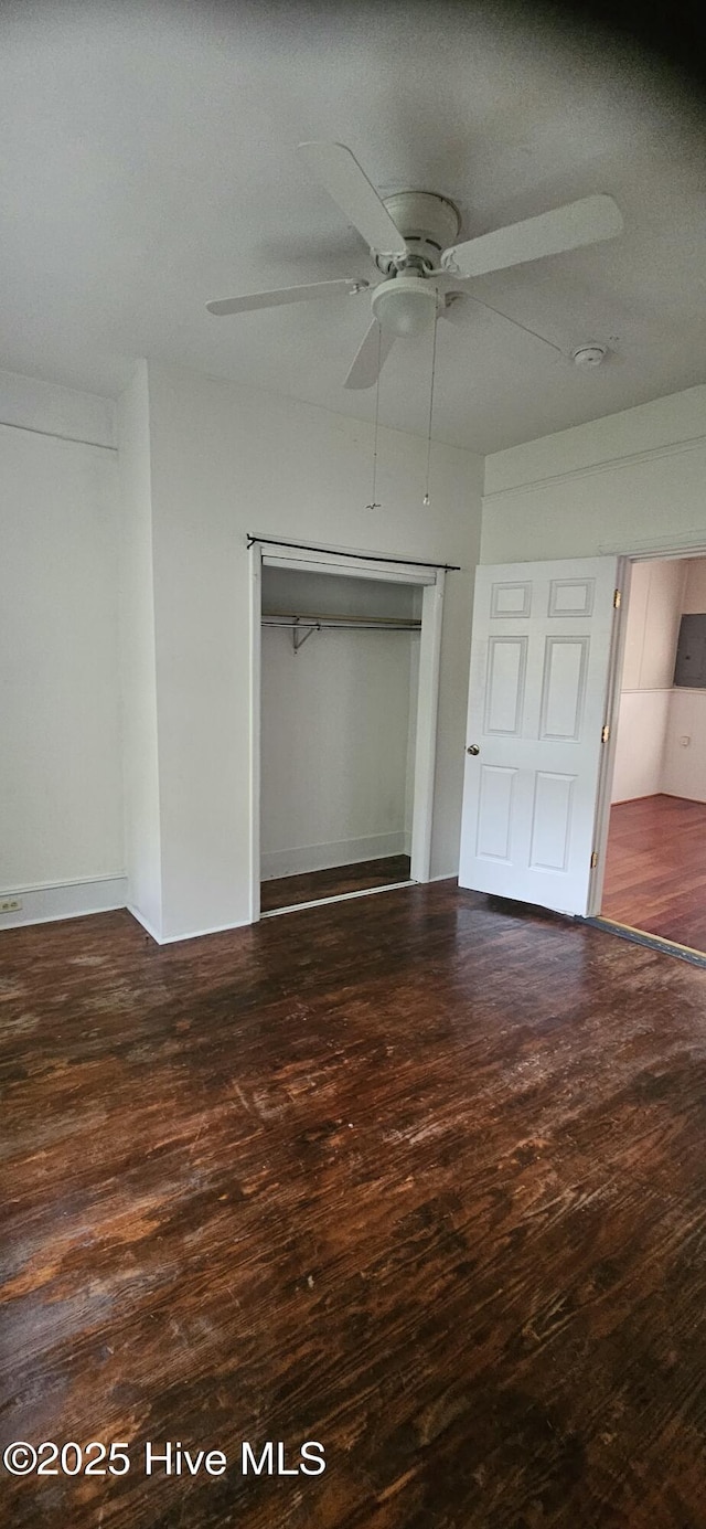 1205 S 7th St, Wilmington, NC 28401 - unfurnished bedroom featuring wood finished floors, a ceiling fan, and a closet
