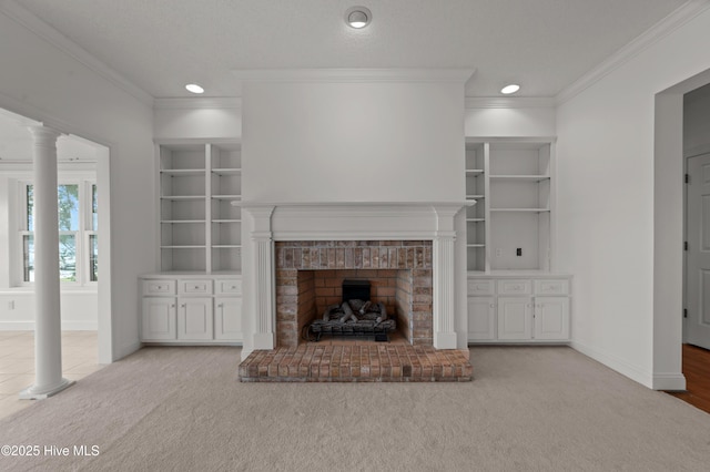 151 Pungo View Rd, Belhaven, NC 27810 - unfurnished living room featuring ornamental molding, a brick fireplace, carpet floors, baseboards, and built in features