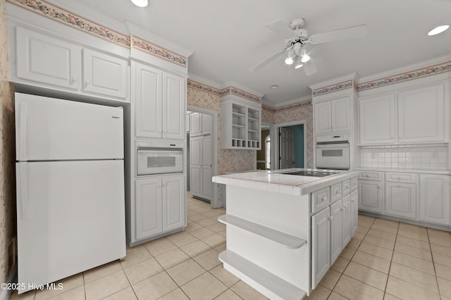 151 Pungo View Rd, Belhaven, NC 27810 - kitchen featuring white appliances, light tile patterned floors, tile countertops, a ceiling fan, and open shelves