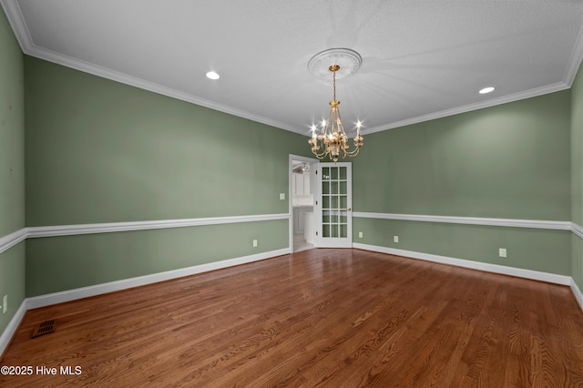 151 Pungo View Rd, Belhaven, NC 27810 - empty room featuring a chandelier, ornamental molding, wood finished floors, baseboards, and recessed lighting