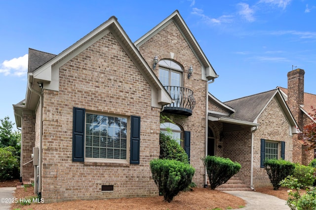 151 Pungo View Rd, Belhaven, NC 27810 - french country style house featuring brick siding, a balcony, a shingled roof, and crawl space