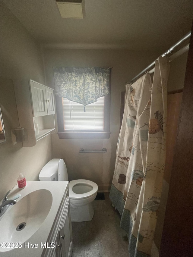 5011 Community Grocery Rd, Wilson, NC 27893 - full bathroom with vanity, toilet, and a shower with curtain