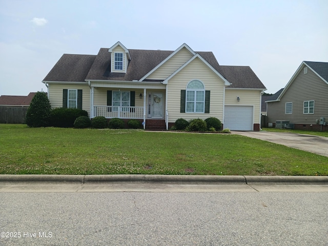 4404 Sunflower Ct NW, Wilson, NC 27896 - view of front of property featuring a porch, concrete driveway, a front yard, an attached garage, and a shingled roof