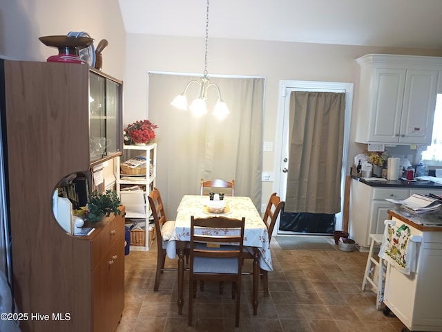 4404 Sunflower Ct NW, Wilson, NC 27896 - dining room featuring a chandelier