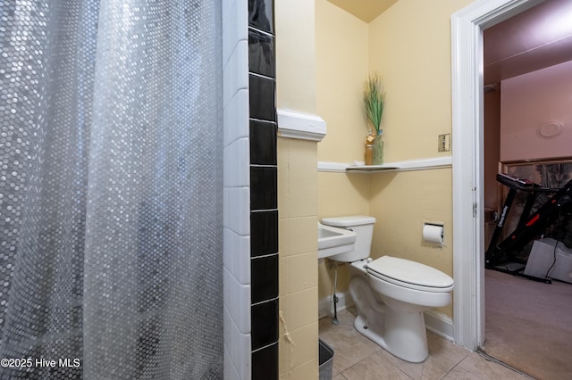 108 Stadium St SW, Wilson, NC 27893 - bathroom with tile patterned flooring and curtained shower