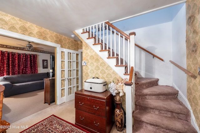 108 Stadium St SW, Wilson, NC 27893 - stairs featuring wallpapered walls, carpet flooring, and ceiling fan