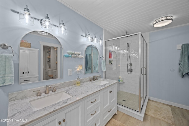 112 Lakeview Ln, Washington, NC 27889 - full bathroom with a stall shower, double vanity, wood finished floors, and crown molding