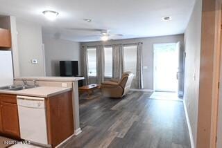 5610 Carolina Beach Rd Unit 6, Wilmington, NC 28412 - kitchen with white dishwasher, open floor plan, brown cabinets, wood finished floors, and light countertops
