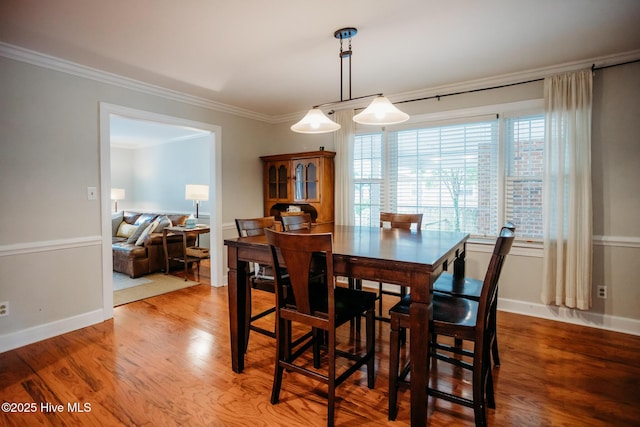 1103 Greenbriar Rd NW, Wilson, NC 27896 - dining room featuring ornamental molding and light wood-style floors