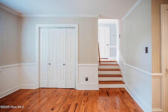 1103 Greenbriar Rd NW, Wilson, NC 27896 - stairs with a decorative wall, crown molding, and wood finished floors