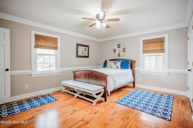 1103 Greenbriar Rd NW, Wilson, NC 27896 - bedroom featuring crown molding, multiple windows, wood finished floors, and a ceiling fan