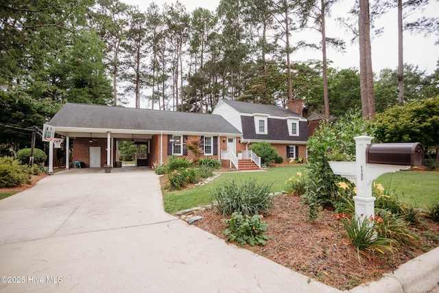 1103 Greenbriar Rd NW, Wilson, NC 27896 - tri-level home featuring brick siding, driveway, a front yard, a carport, and roof with shingles