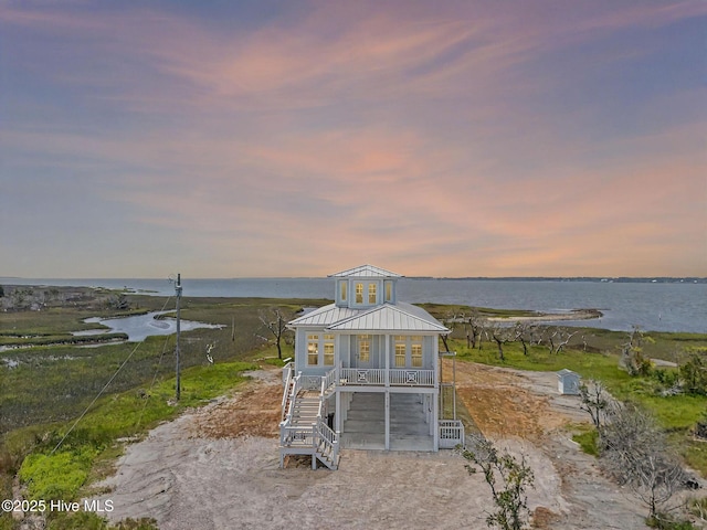 316 Bettie Path Rd, Beaufort, NC 28516 - rear view of house with a porch, a water view, and stairs
