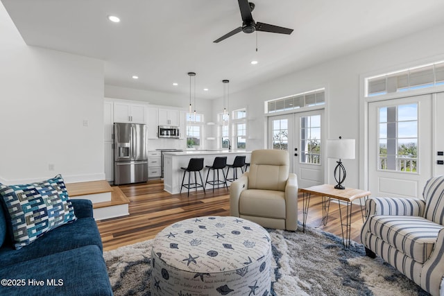 316 Bettie Path Rd, Beaufort, NC 28516 - living room featuring dark wood-style flooring, a ceiling fan, recessed lighting, french doors, and baseboards