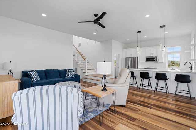 316 Bettie Path Rd, Beaufort, NC 28516 - living room with wood finished floors, recessed lighting, a ceiling fan, and stairway
